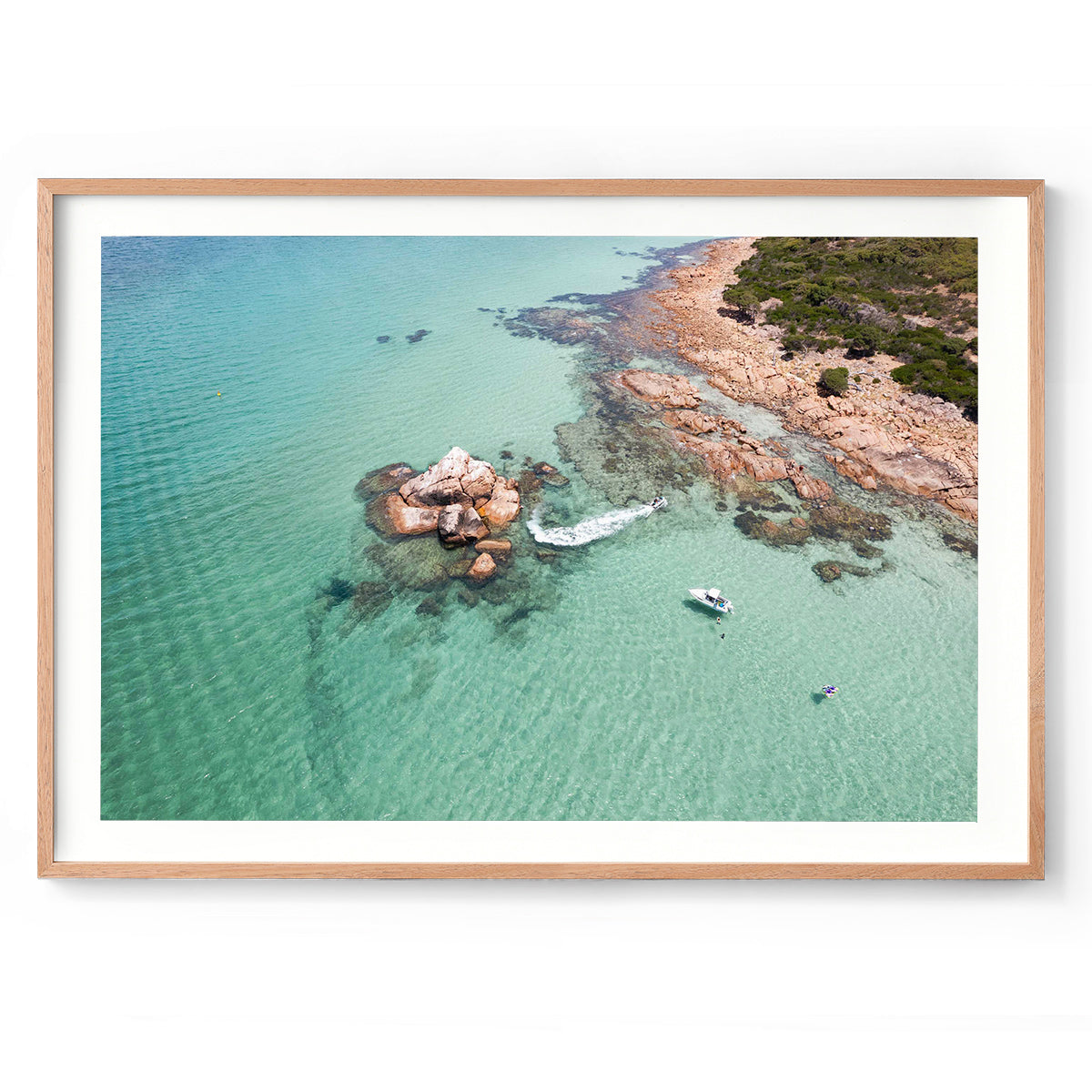 Horizontal drone photo of a boat and jetski in the turquoise ocean off the coast of Western Australia near Dunsborough and Meelup Beach. Original fine art photography, available as prints and framed wall art. Perfect for a coastal home or beach house.