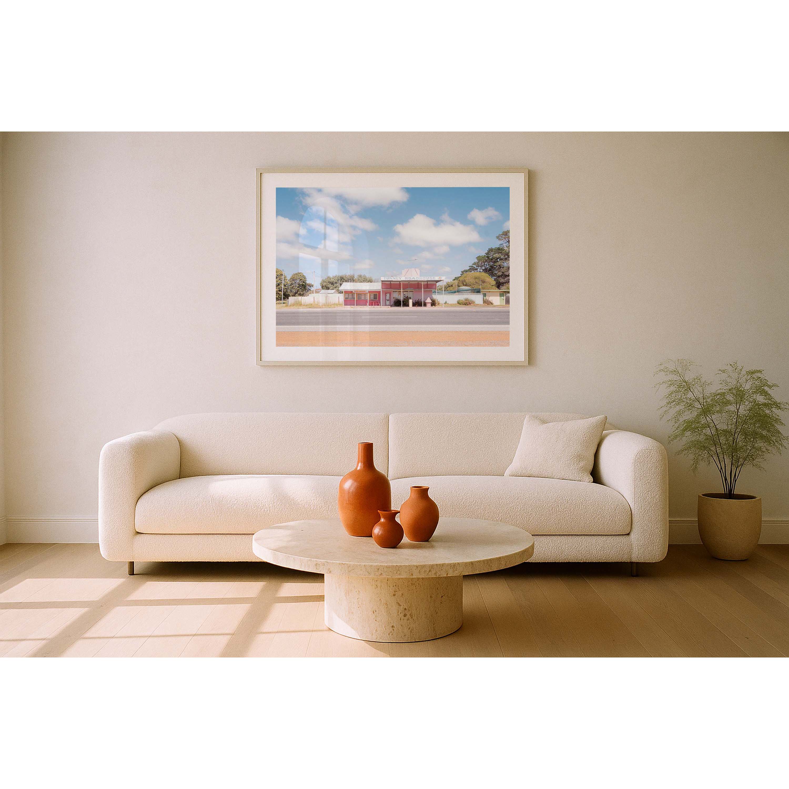 Horizontal photo of Tunney Roadhouse in Western Australia. Pink roadhouse with pastel blue skies and fluffy clouds. Original fine art photography, available as prints and framed wall art. Perfect for your living room, dining room, bedroom or home office. Shipped free worldwide.