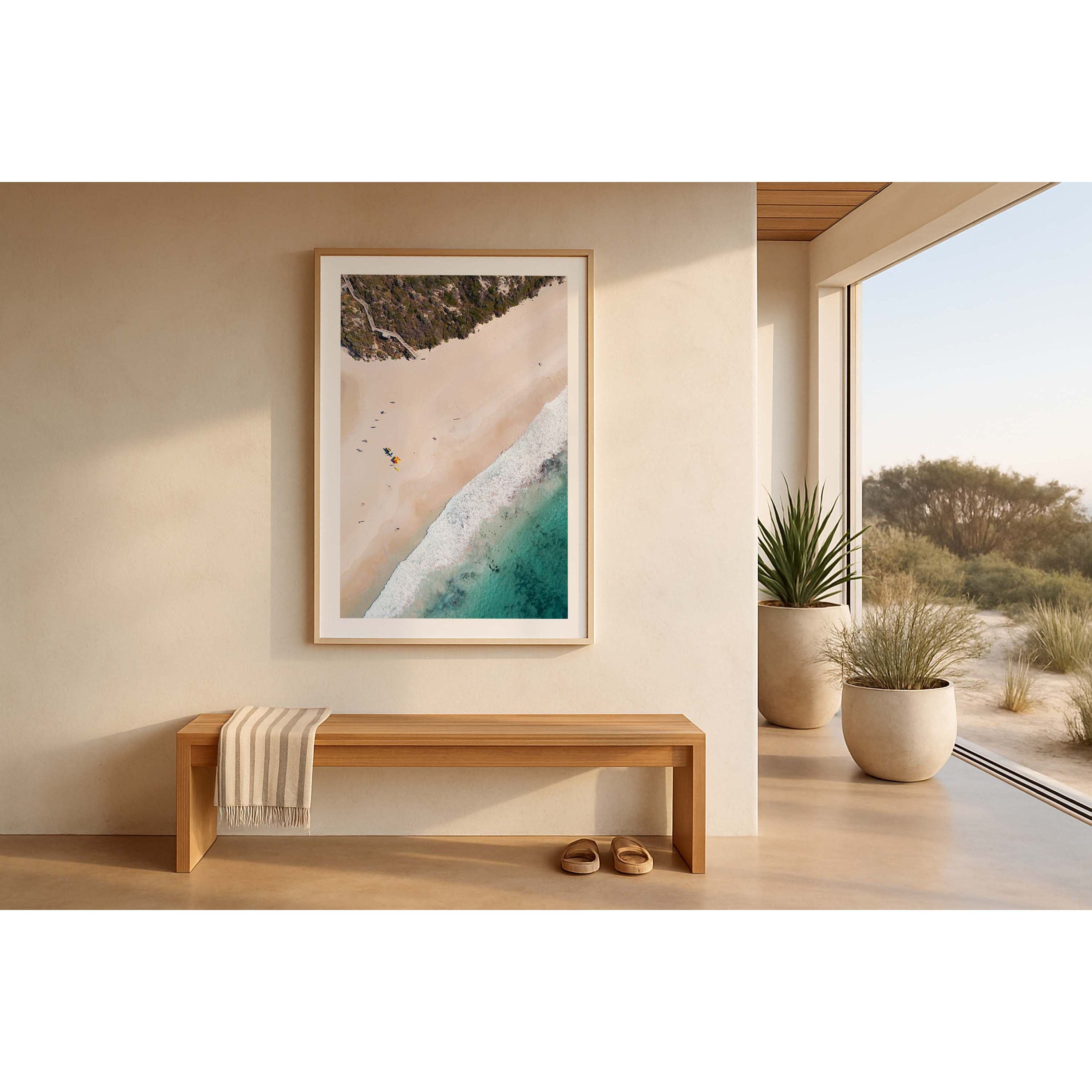 Vertical drone photo of Smiths Beach in Western Australia. The staircase comes down from the top left hand corner, there is an iconic red and yellow lifeguard tent and small surfers dot the white sand as they walk in a line towards the stairs. The turquoise blue water comes in the bottom right hand corner. Perfect for the modern beach home or  coastal interior. Original fine art photography, available as prints and framed wall art.